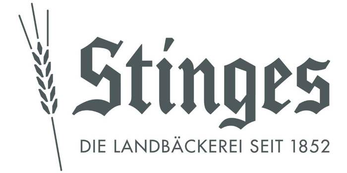 Stinges Landbäckerei Logo mit Weizenähre und Schriftzug "Die Landbäckerei seit 1852